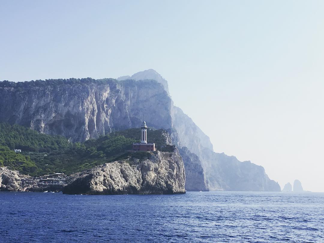 Headed to our secret swimming spot and to explore some caves. #yachtlifestyle #beautiful #capri #lighthouse #lifeonthewater #luxury #islandhopping #perfectday #blueattraction #mediterranean